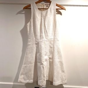 Sleeveless white tweed dress